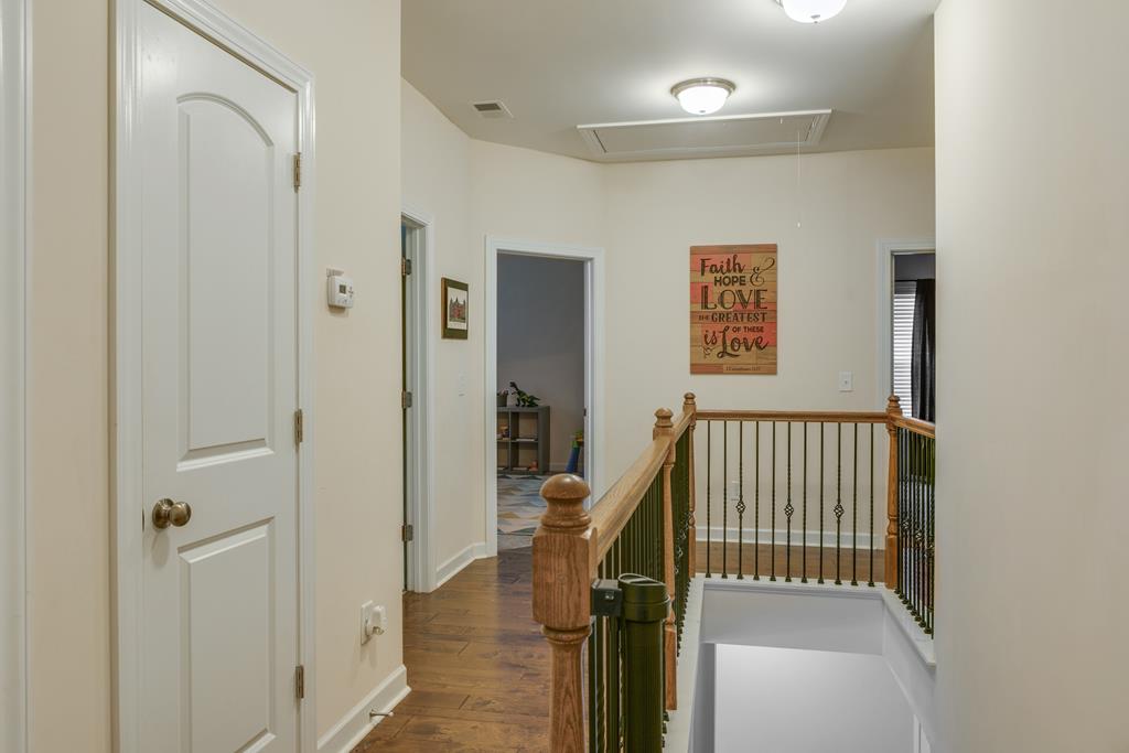 Upstairs Hallway/Foyer leads to 3 guest bedrooms 